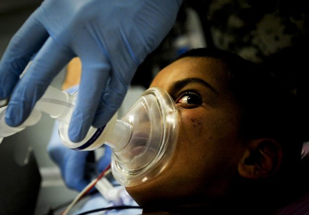 An Afghan child is prepared for anesthesia before undergoing a hydrocelectomy at Forward Operating Base Farah in Farah province, Afghanistan, April 10, 2010. The surgical procedure was conducted by members of the Farah Forward Surgical Team and an Afghan physician as a way to provide mentoring and a joint learning opportunity.