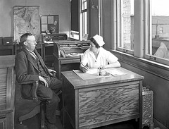 Image: “Nurse with patient in City Hospital Tuberculosis Division, 1927” by Seattle Municipal Archives. License: CC BY 2.0